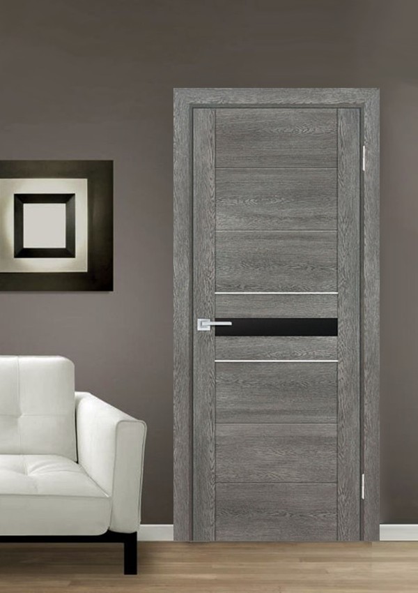 dveri mezhkomnatnyie dveri ekoshpon pvh model psn 3 gridzhio antiko chernyiy lakobel stil hay tek 01 Межкомнатнык двери модели PSN- 3 Идеально имитирует фактуру дерева. Применяется отделка - шпон NANO-FLEX. Многослойное покрытие, на ощупь бархатистое, теплое. Устойчиво к влаге и бытовым моющим веществам. Не выгорает и не выцветает. В моделях серии PSK отсутствует верхняя и нижняя горизонтальные царги, что придает дверной конструкции визуальную легкость. <a href="#opisglav">Подробнее</a>