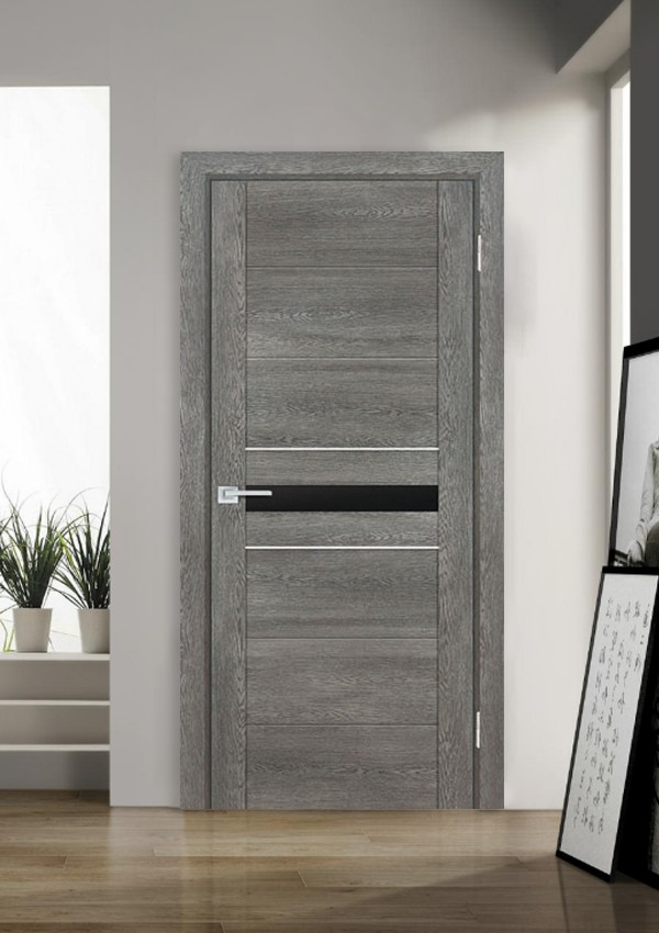 dveri mezhkomnatnyie dveri ekoshpon pvh model psn 3 gridzhio antiko chernyiy lakobel stil hay tek 02 Межкомнатнык двери модели PSN- 3 Идеально имитирует фактуру дерева. Применяется отделка - шпон NANO-FLEX. Многослойное покрытие, на ощупь бархатистое, теплое. Устойчиво к влаге и бытовым моющим веществам. Не выгорает и не выцветает. В моделях серии PSK отсутствует верхняя и нижняя горизонтальные царги, что придает дверной конструкции визуальную легкость. <a href="#opisglav">Подробнее</a>